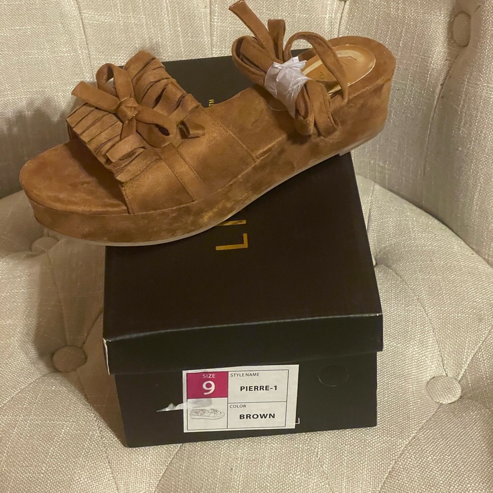 Ladies size 9.0 Brown Suede Lace up the leg sandal
